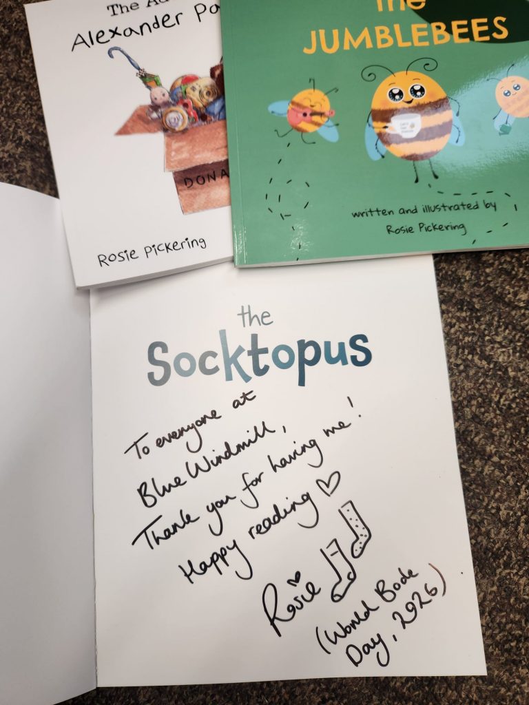 Rugby authors book gift to Blue Windmill Day Nursery